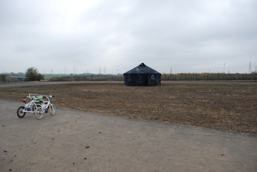black yurt in landscape